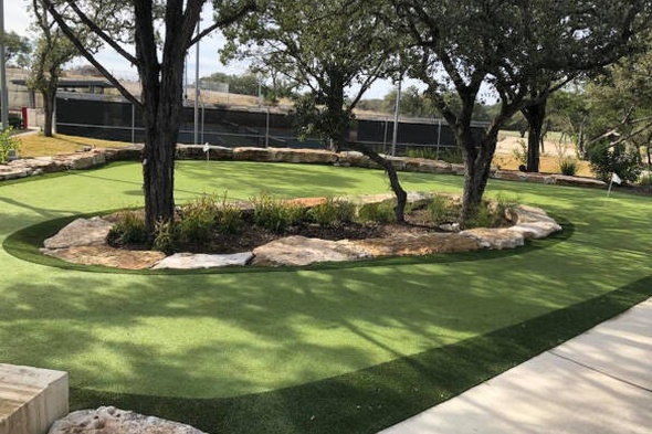 Augusta residential backyard putting green grass